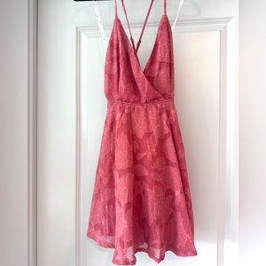 Cross back dress with flower embellishments